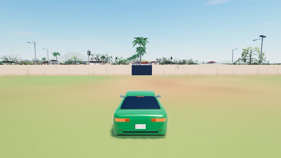 An FCT green taxi at a signalised junction